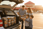 Busy family picking up Chef Shaby y Su Mai meal prep at Buc ees Denton Texas on a Sunday
