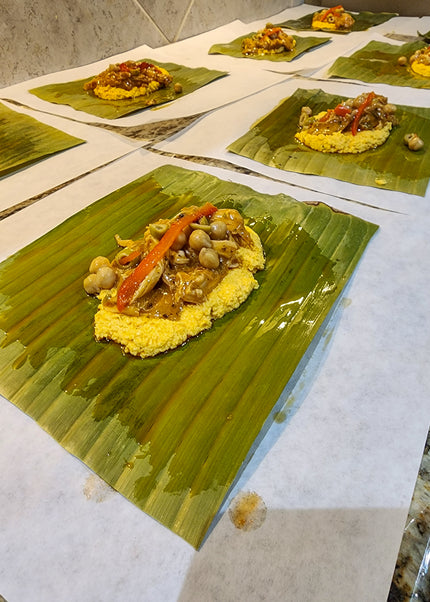 “Traditional Puerto Rican pasteles wrapped in banana leaves handmade weekly by Chef Shaby y Su Mai”