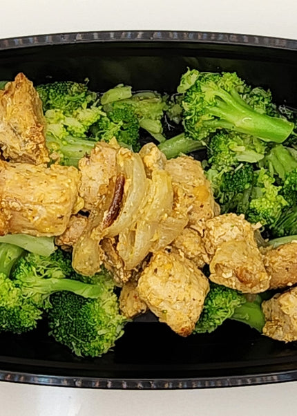 Roasted pork slices with seasoned crust in a Chef Shaby meal prep dish