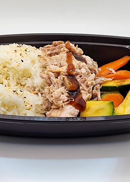 Hawaiian pork with pineapple glaze in a meal prep tray