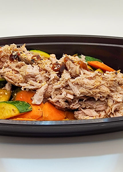 Hawaiian pork with pineapple glaze in a meal prep tray