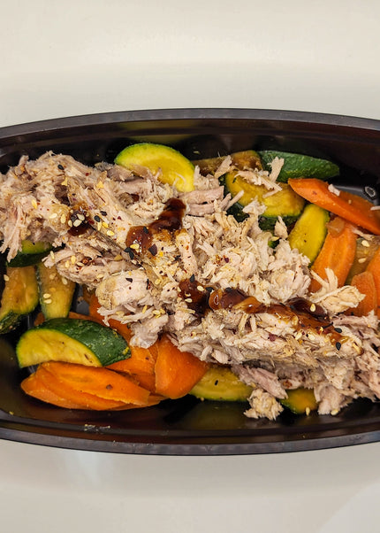 Hawaiian pork with pineapple glaze in a meal prep tray