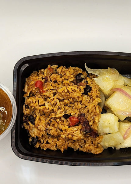 Ropa vieja shredded beef with Congri rice in a Chef Shaby meal prep container