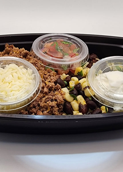 Beef burrito bowl with rice and beans in a Chef Shaby meal prep container