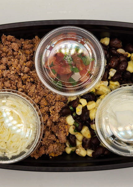 Beef burrito bowl with rice and beans in a Chef Shaby meal prep container