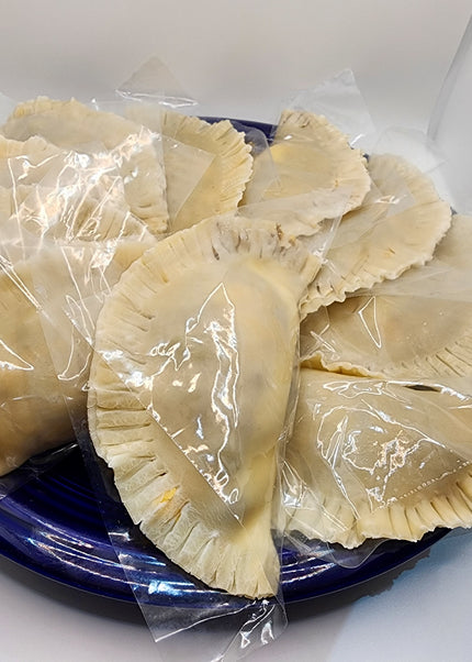 “Puerto Rican empanadilla preñá filled with meat and cheese made fresh by Chef Shaby y Su Mai in Denton Texas”