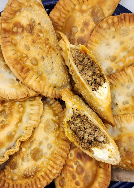 “Puerto Rican empanadilla preñá filled with meat and cheese made fresh by Chef Shaby y Su Mai in Denton Texas”