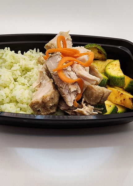 Pulled carnitas pork with seasoning in a Chef Shaby meal prep container
