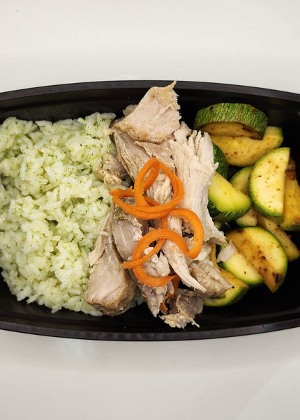 Pulled carnitas pork with seasoning in a Chef Shaby meal prep container