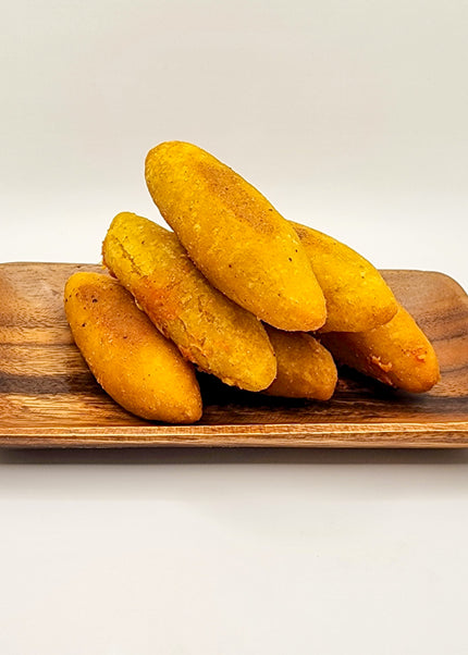 “Fresh Puerto Rican sorullitos rellenos de queso filled with cheese made by Chef Shaby y Su Mai in Denton TX”