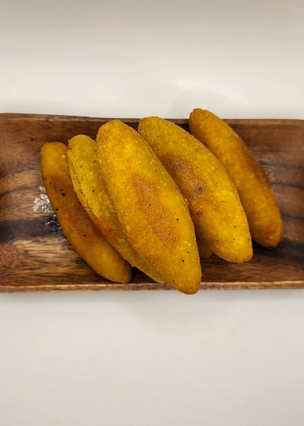 Fresh fried sorrullitos prepared for weekly Puerto Rican inspired meal prep in Denton Texas