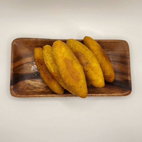 Fresh fried sorrullitos prepared for weekly Puerto Rican inspired meal prep in Denton Texas