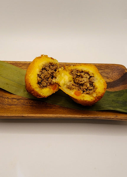 “Homemade Puerto Rican Rellenos de Papa stuffed with seasoned beef prepared in Denton Texas”