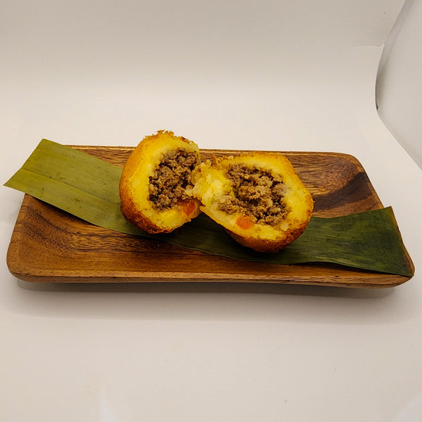 “Homemade Puerto Rican Rellenos de Papa stuffed with seasoned beef prepared in Denton Texas”