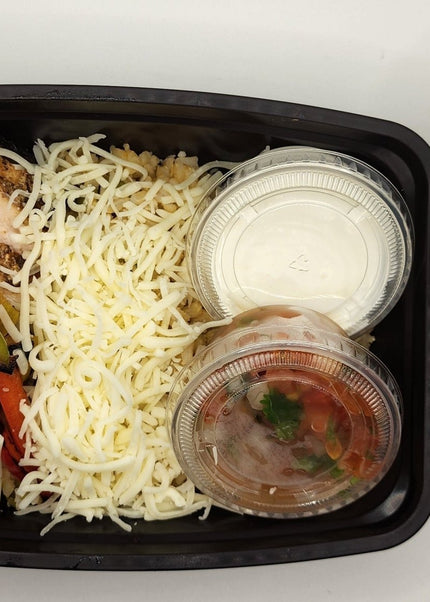 Chicken fajitas with peppers and rice in a Chef Shaby meal prep bowl
