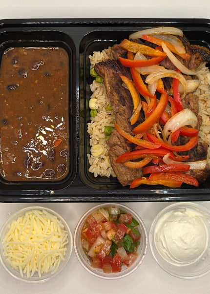 Beef fajita bowl with peppers onions and rice prepared fresh by Chef Shaby y Su Mai in Denton Texas